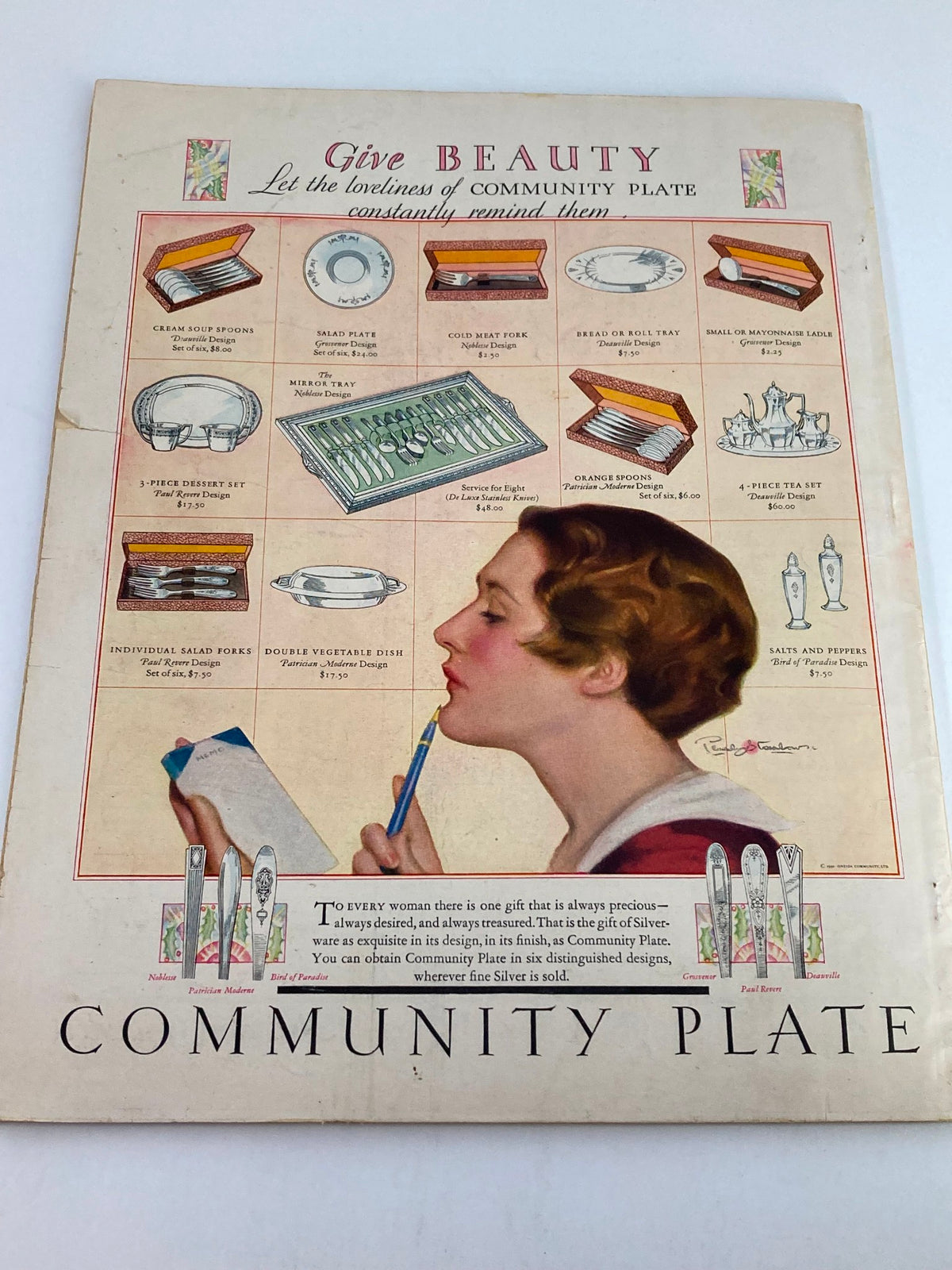 Ad page from VTG Delineator Magazine December 1930 promoting Community Plate silverware with a fashionable woman holding a pencil for gift ideas.