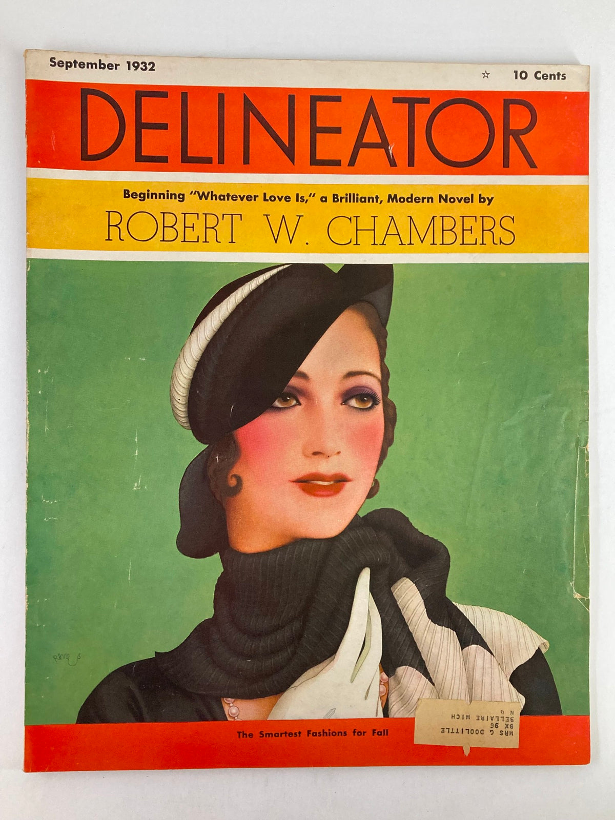 Cover of the VTG Delineator Magazine from September 1932 featuring the title 'Whatever Love Is' by Robert W. Chambers, showcasing a vintage illustration of a woman in a stylish hat and scarf.