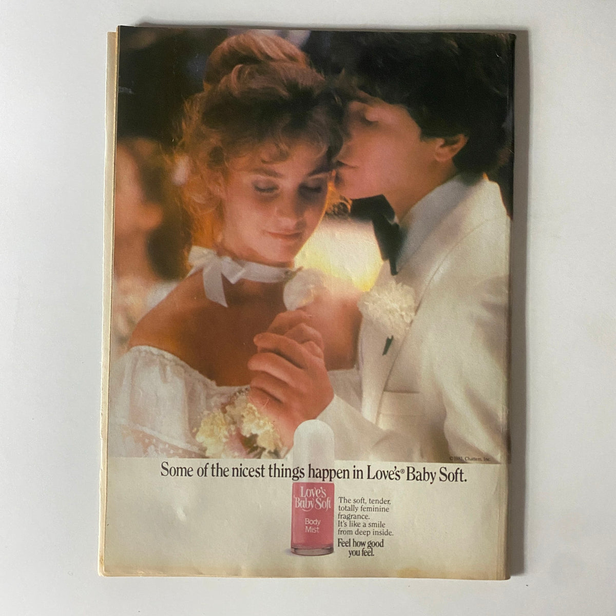 Advertisement for Love's Baby Soft featuring a romantic image of a couple dancing, featured in Tiger Beat Magazine July 1982.