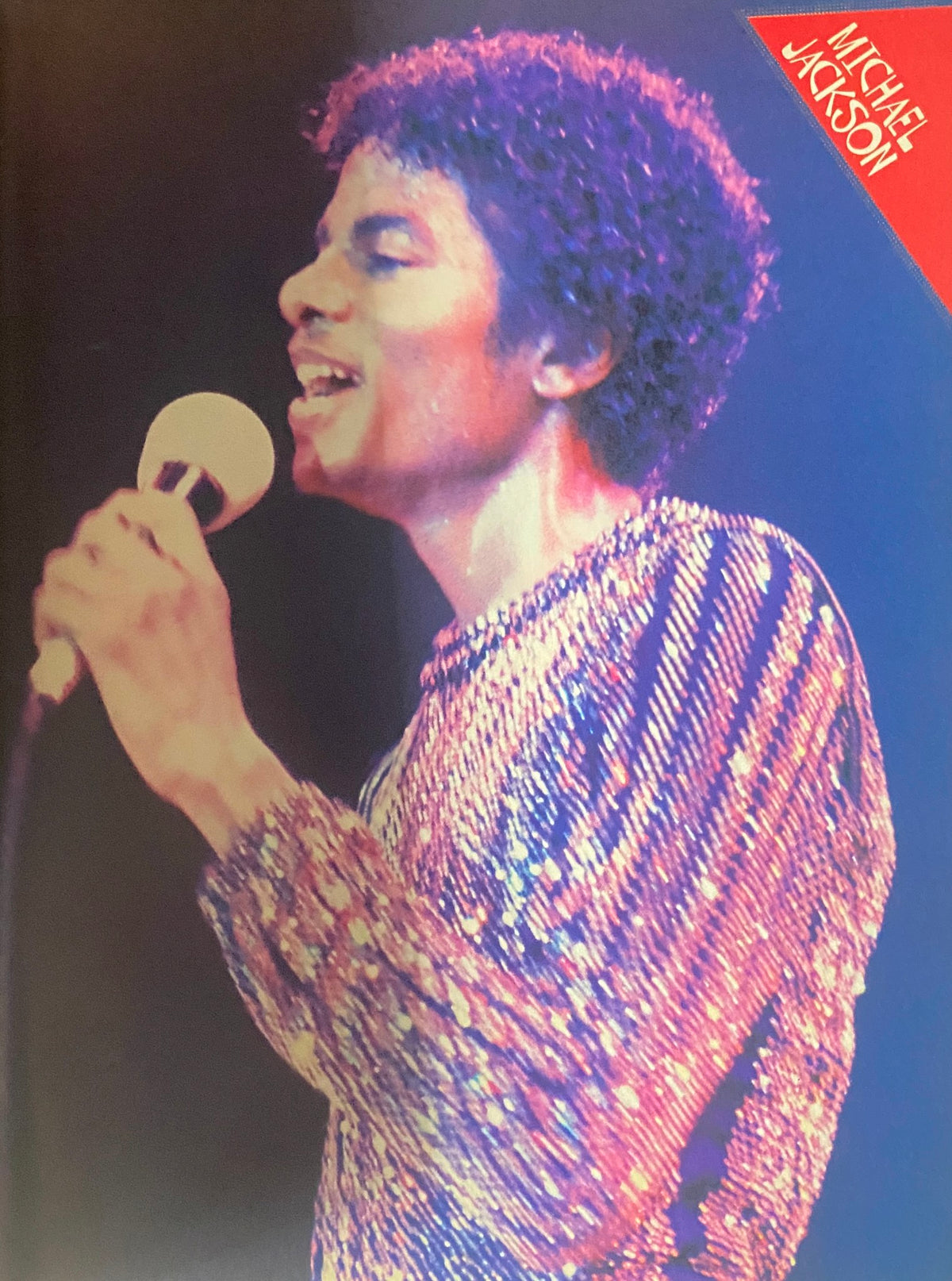 Dynamic photograph of Michael Jackson performing on stage in Tiger Beat Magazine October 1980, capturing the essence of his musical genius.