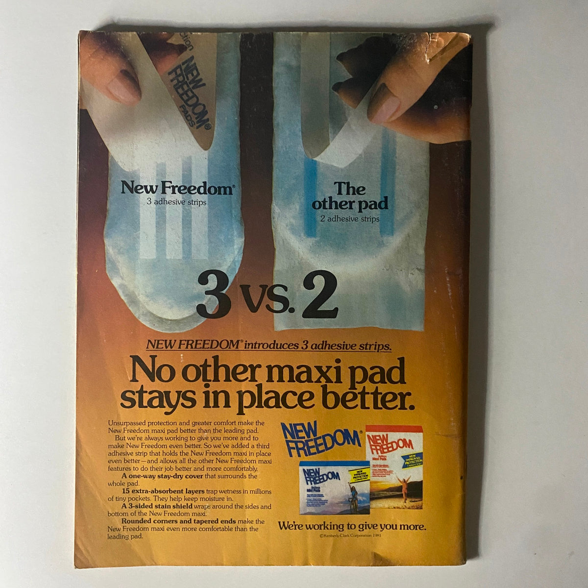 Tiger Beat Star Magazine October 1981 advertisement for New Freedom maxi pad comparing adhesive strips in a visually engaging way.