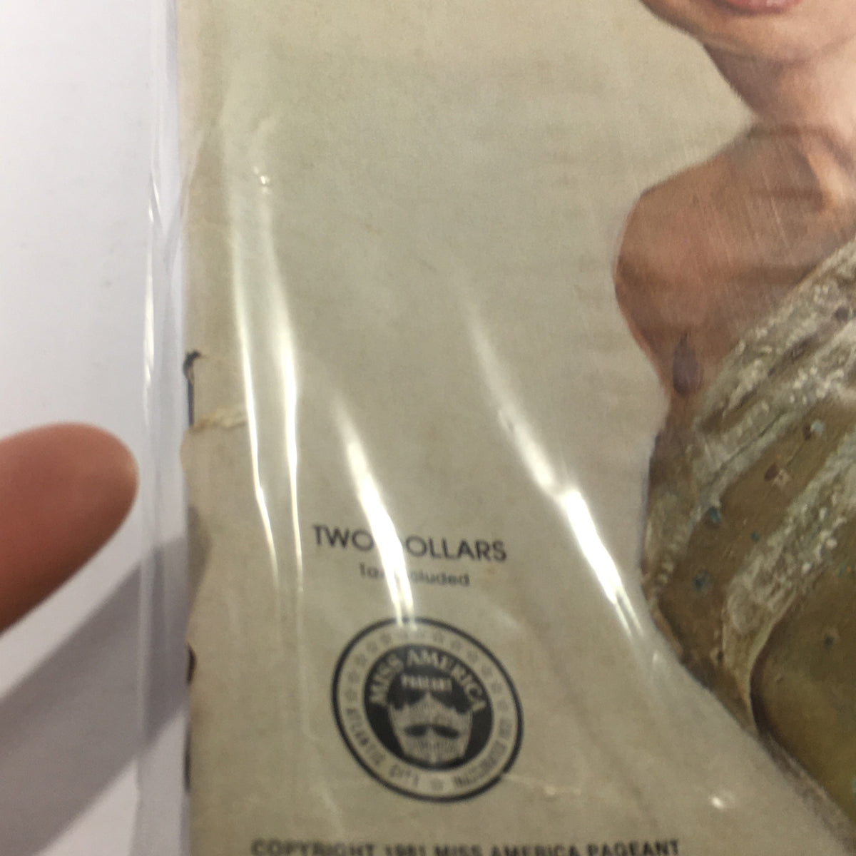 Back cover of the 1981 The Miss Nebraska Pageant magazine, displaying the price 'Two Dollars' and copyright details, emphasizing the vintage character of this collectible.