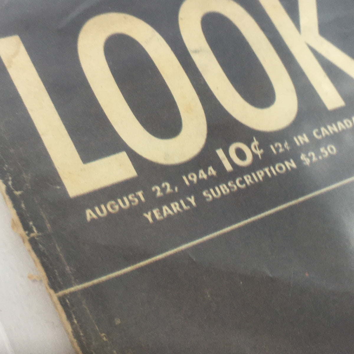 Detailed view of the Look Magazine title block from August 22, 1944, featuring pricing information and publication date, emphasizing its historical significance.