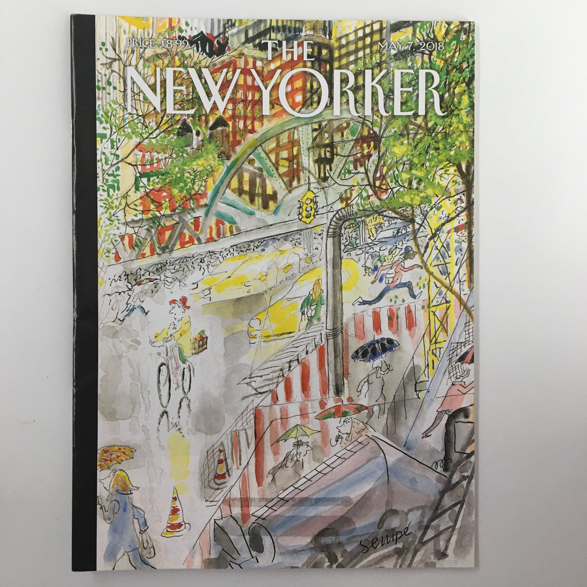 The New Yorker Magazine May 7 2018 cover featuring vibrant watercolor illustration titled 'Biking in the Rain' by Jean-Jacques Sempé.