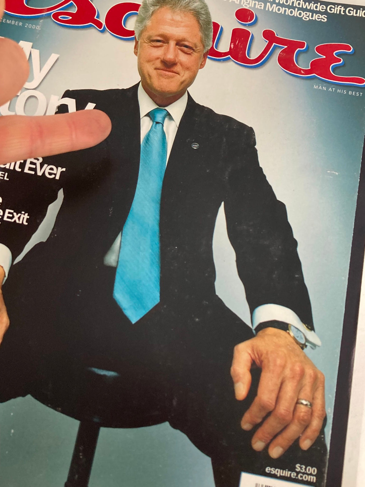 Close-up of the Esquire Magazine December 2000 cover featuring Bill Clinton, highlighting his portrait and the title 'My Story: The Most Revealing Portrait Ever', emphasizing his seated pose with hands visible.