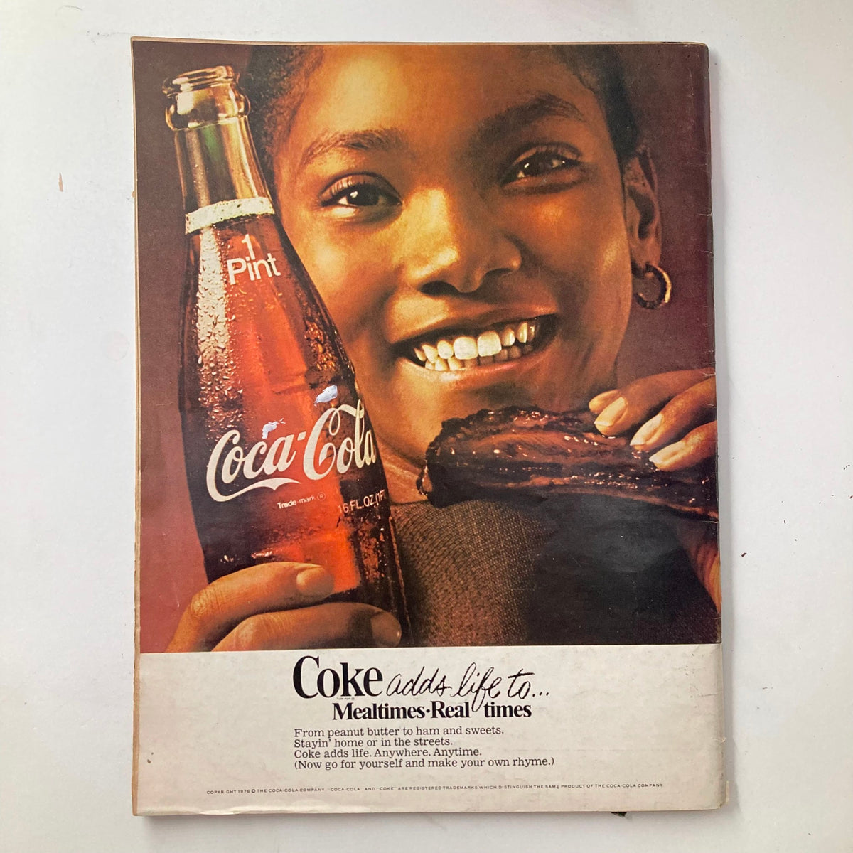 A cheerful young girl enjoying a Coca-Cola, highlighting a nostalgic advertisement on food and drink culture. VTG Ebony Magazine July 1976 Billy Dee Williams, James Earl Jones GD Interior.