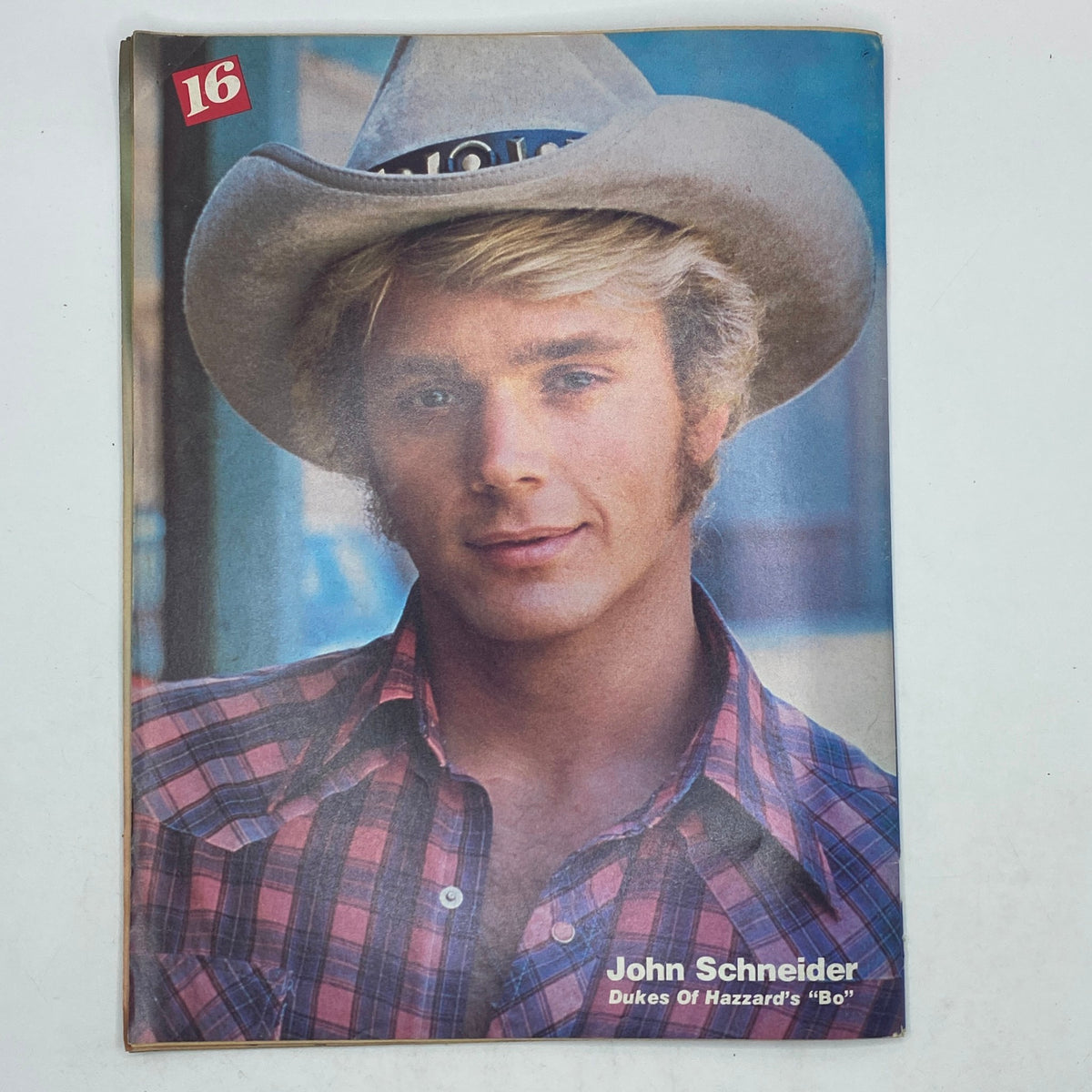 16 Magazine July 1980 cover of John Schneider, celebrated star of The Dukes of Hazzard, displaying vintage charm of the era.