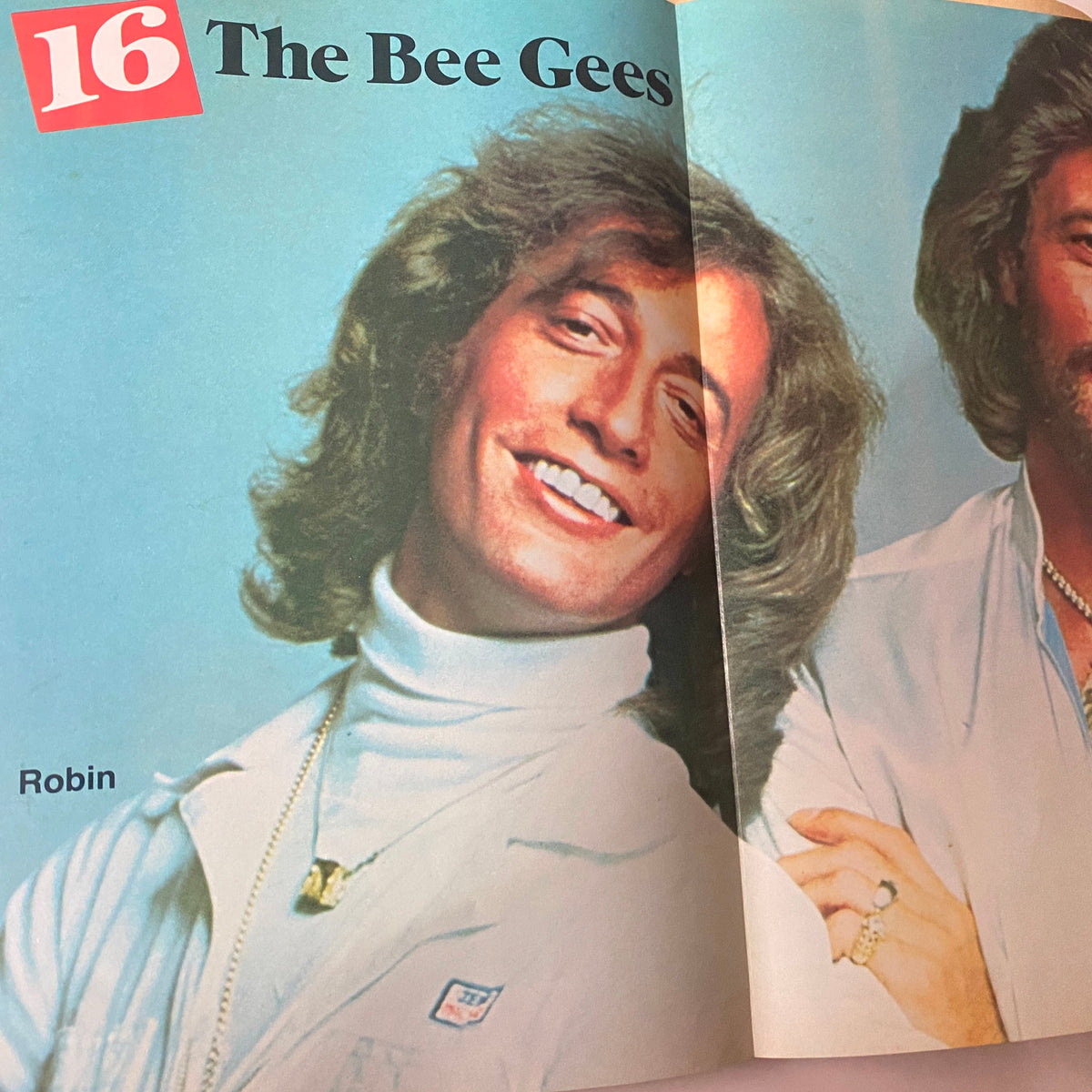 16 Magazine September 1979 image of Robin Gibb from the Bee Gees smiling and dressed in stylish attire, highlighting pop culture of the era.