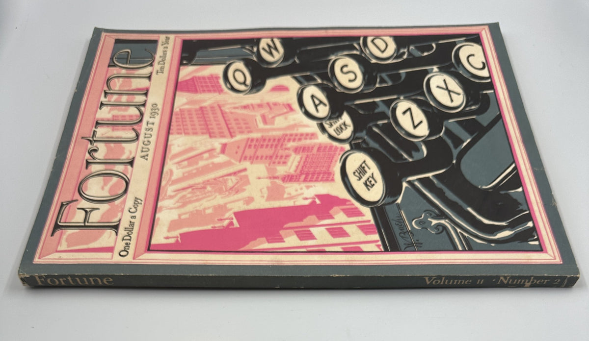 Another view of the August 1930 issue of Fortune Magazine showcasing typewriter keys and a vibrant cityscape, highlighting Gandhi and skyscrapers.