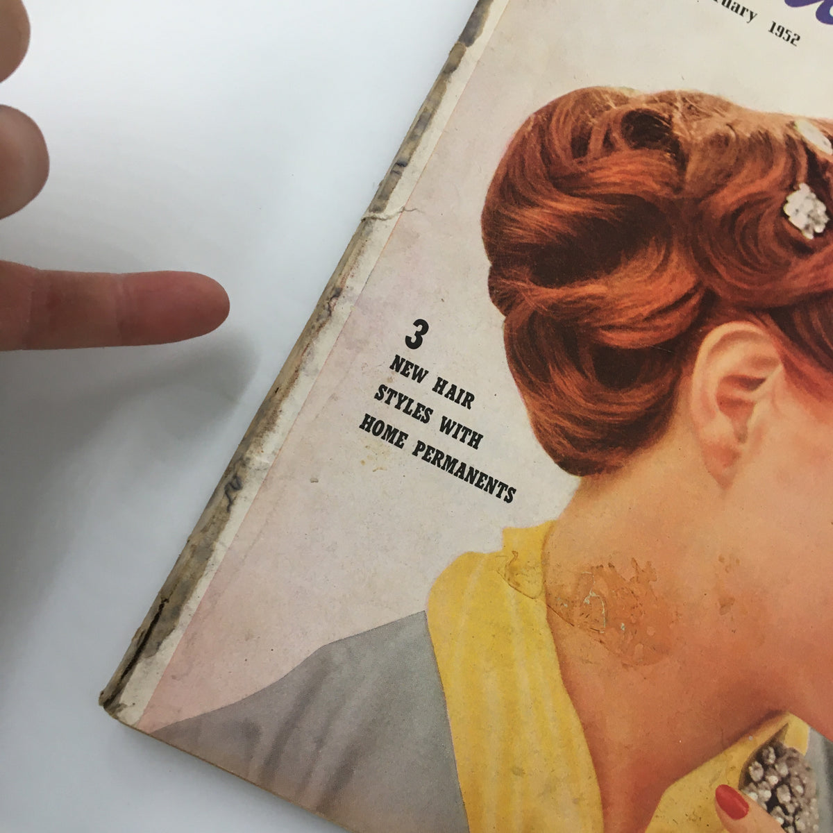 Close-up of the cover of VTG Family Circle Magazine February 1952 highlighting the text '3 New Hair Styles with Home Permanents'.