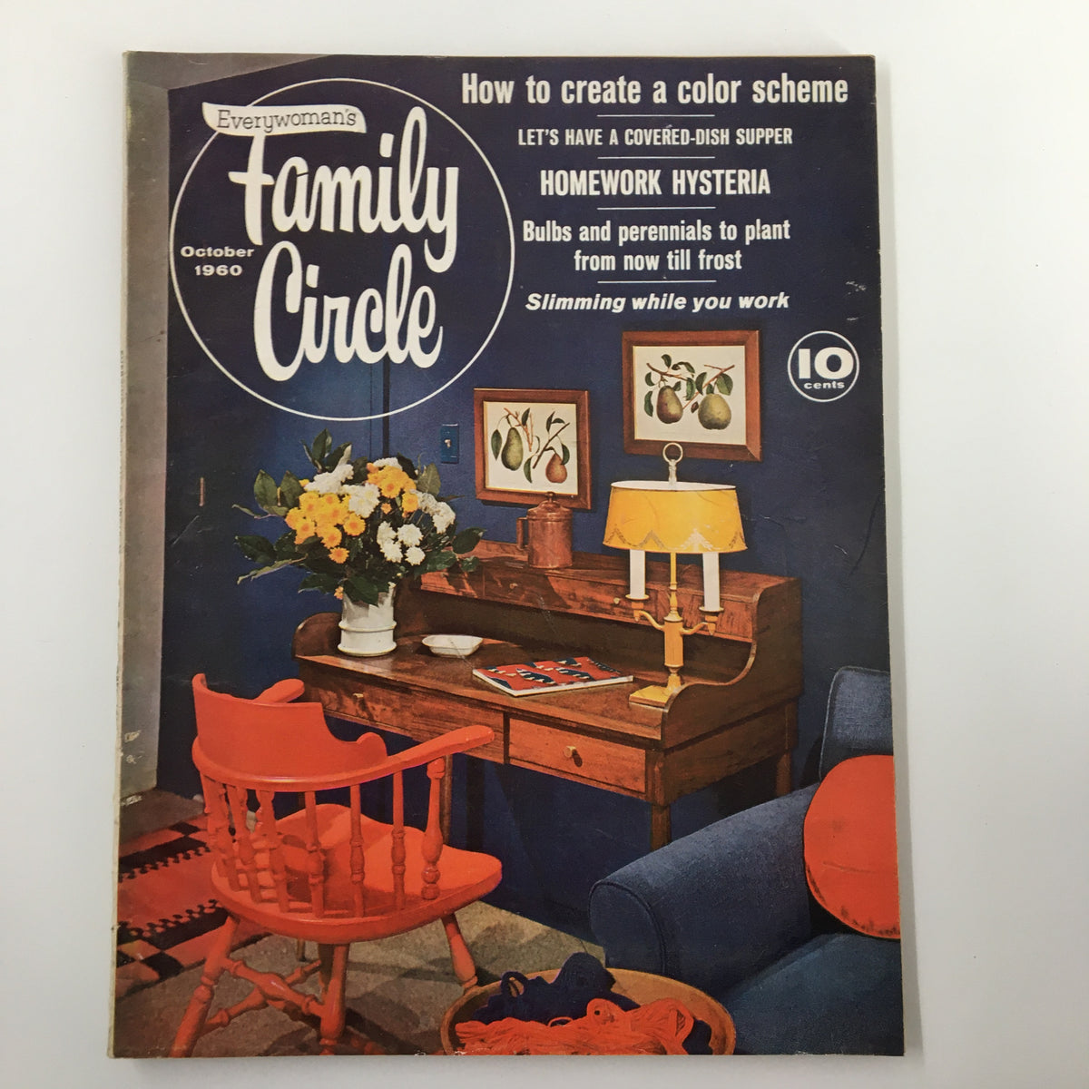 Cover of VTG Family Circle Magazine from October 1960 featuring the theme 'Let's Have a Covered-Dish Supper,' showcasing a cozy living room setting, vibrant colors, and floral arrangements, reflecting retro culinary culture.