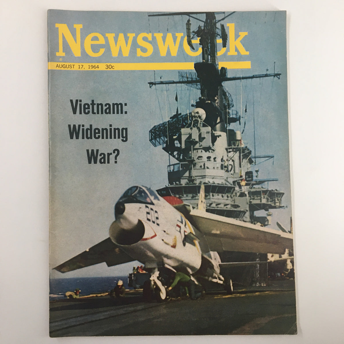 VTG Newsweek Magazine August 17 1964 cover featuring the title 'Vietnam: Widening War?' showcasing a military aircraft on a carrier deck, reflecting the historical context of the Vietnam War.