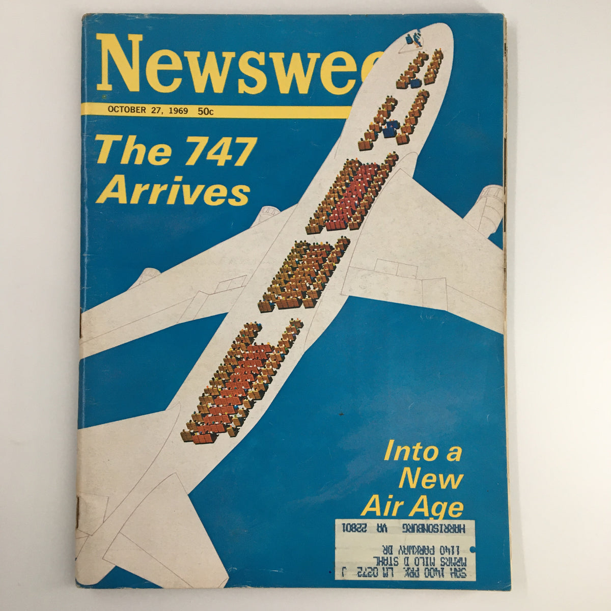 Cover of the VTG Newsweek Magazine from October 27, 1969, titled 'The 747 Arrives Into A New Air Age'. The cover features a vibrant blue background with an illustration of the Boeing 747 and a depiction of passengers inside.