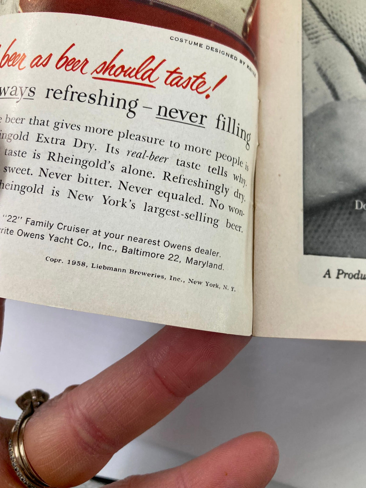 Advertisement page from the 1958 Playbill featuring a promotional piece for Rheingold Extra Dry beer, showcasing vintage marketing from the era.