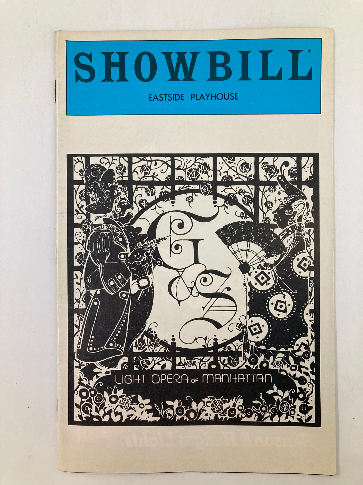 1981 Showbill for Eastside Playhouse featuring the production of The Merry Widow, showcasing the title in bold blue letters and an intricate black and white design.