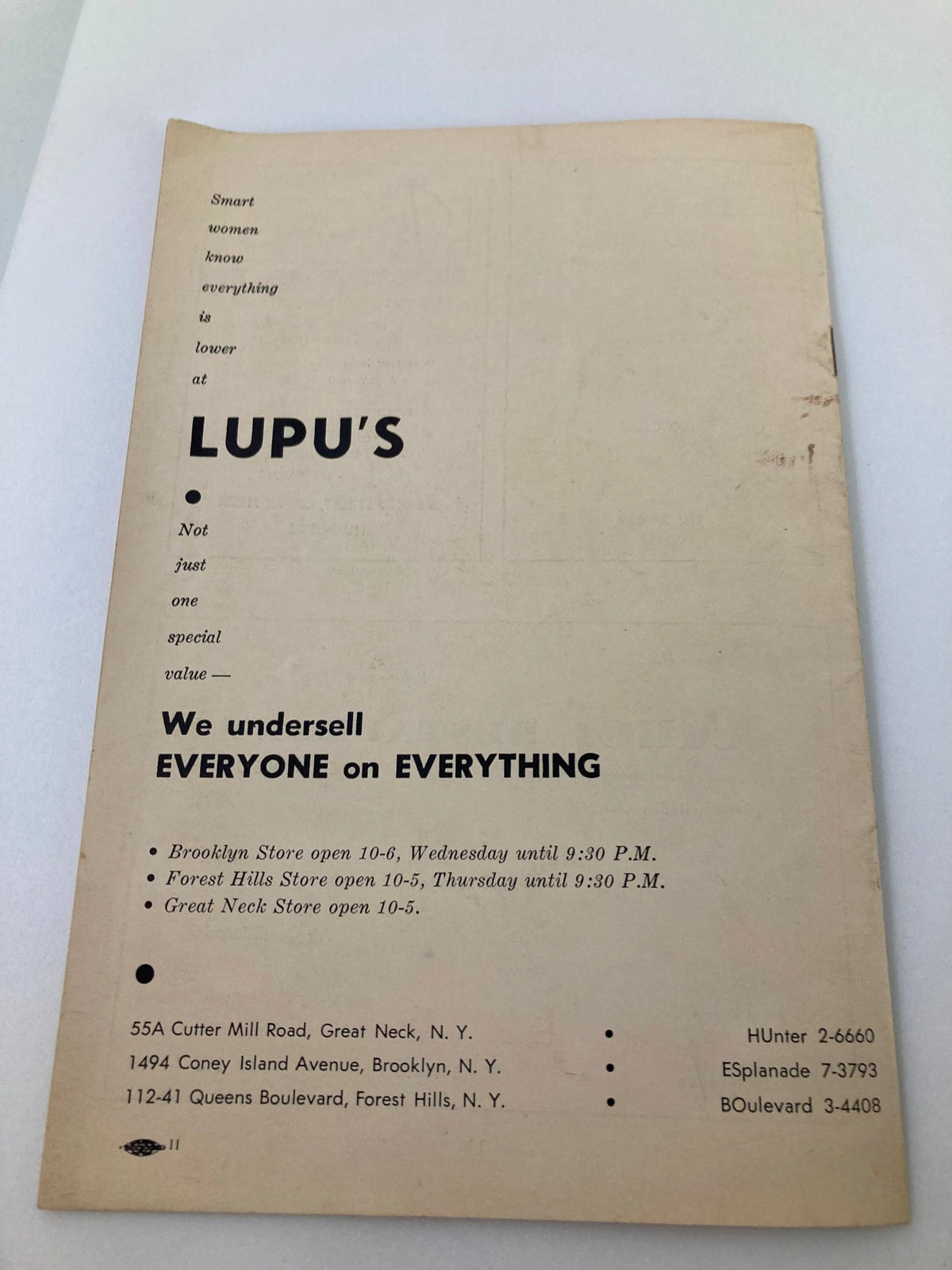 Back cover of the 1963 Great Neck Community Theatre Program for The Visit by Friedrich Duerrenmatt, showcasing an advertisement for Lupu's, a local business.
