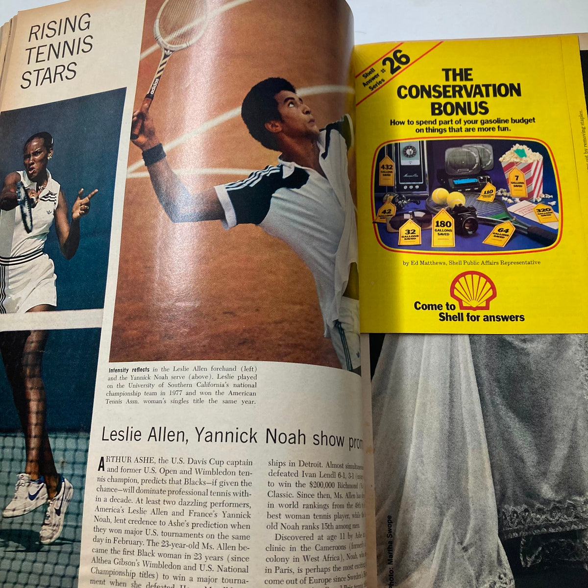 Action shot of tennis players Leslie Allen and Yannick Noah, capturing their intense focus during a match. This image is included in the VTG Ebony Magazine June 1981 titled 'Has Success Spoiled Jesse Jackson GD Interior'.