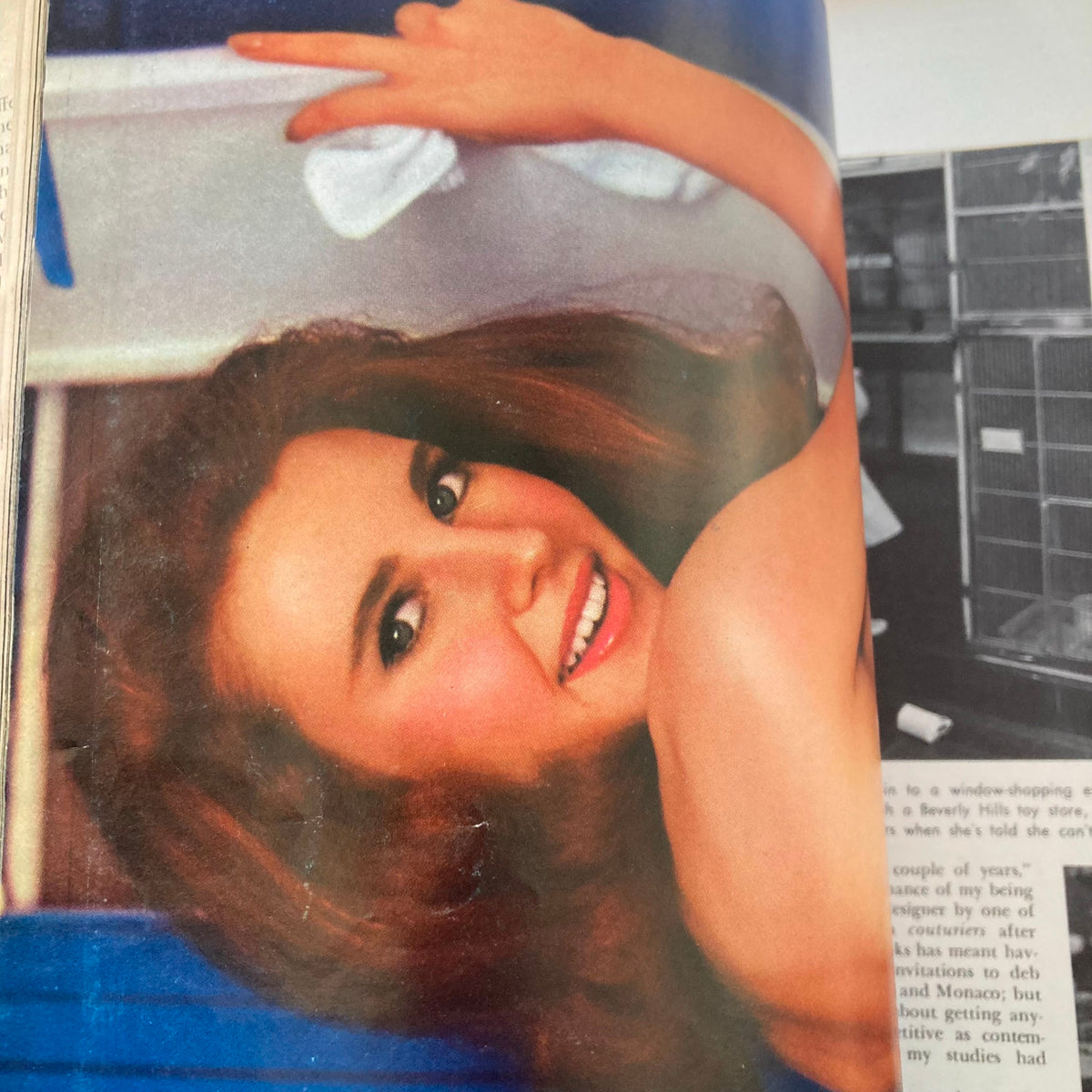 Close-up image of Tish Howard, the centerfold from the VTG Playboy Magazine July 1966, showcasing her smiling expression and styled hair.