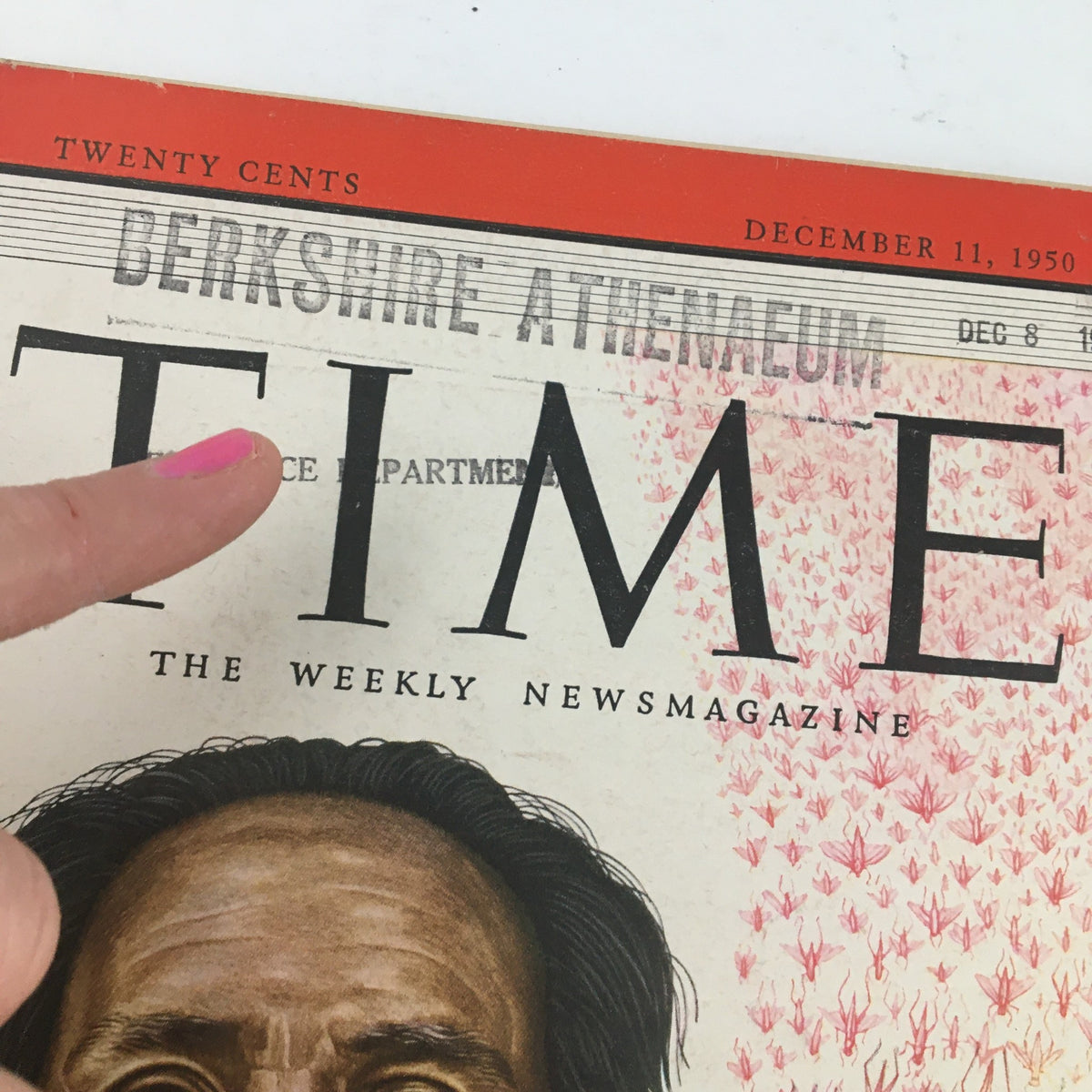 Close-up view of the cover of Time Magazine December 11, 1950 Vol 56 #24 displaying the title prominently with an address label and a finger pointing at the top. Featured cover story centers on Red China's Mao Zedong.