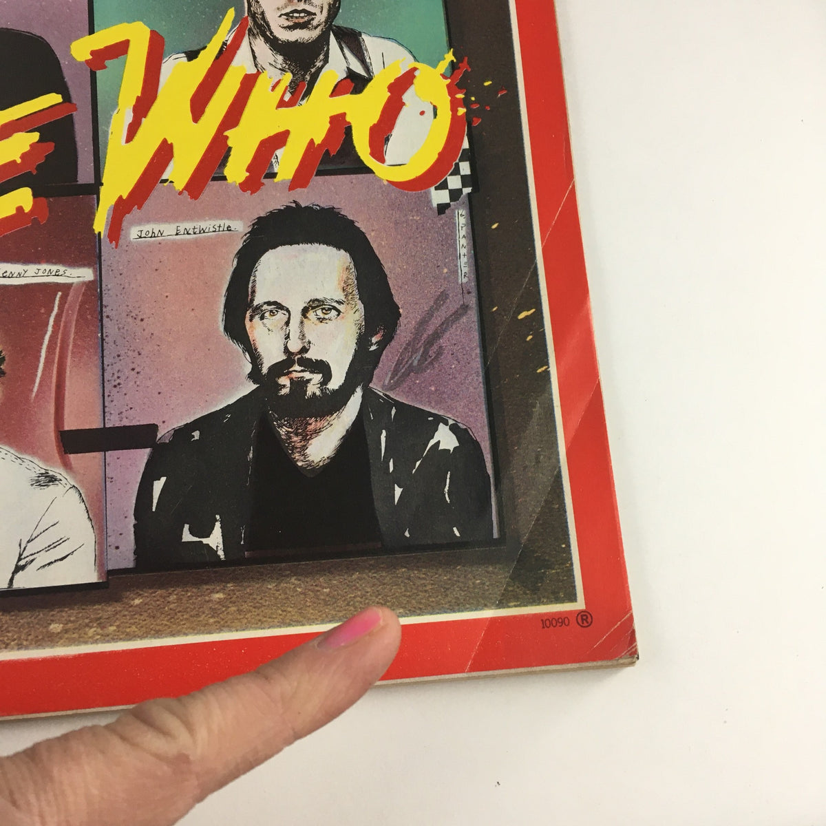 Close-up view of the Time Magazine cover from December 17, 1979, showcasing The Who. Featured prominently is John Entwistle among other band members.