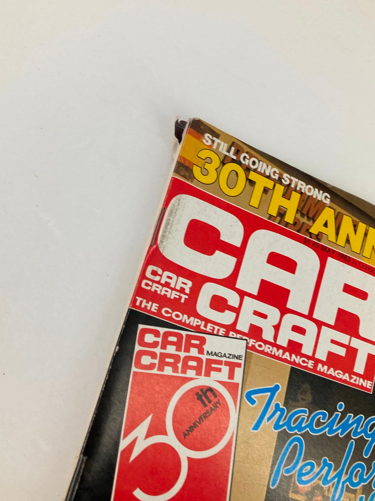 Close-up view of the top corner of the VTG Car Craft Magazine May 1983 Vol 31 #5, highlighting its 30th Anniversary edition with a bold title and vintage design elements.