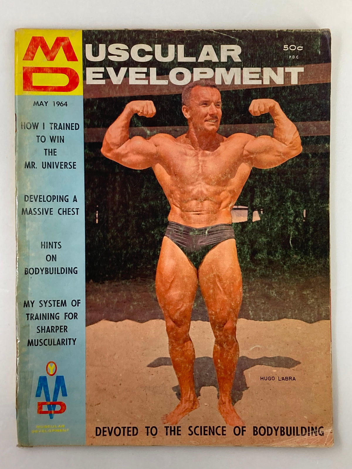 Cover of VTG Muscular Development Magazine May 1964 featuring Hugo Labra showcasing bodybuilding techniques and tips.