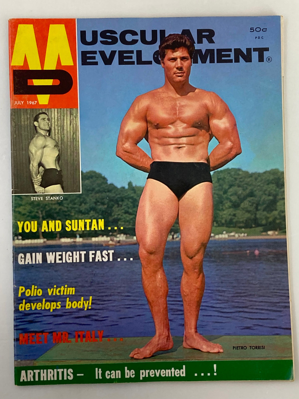 Cover of VTG Muscular Development Magazine July 1967, Vol 4 #7 featuring Pietro Torrisi, showcasing bodybuilding aesthetics with vibrant colors.
