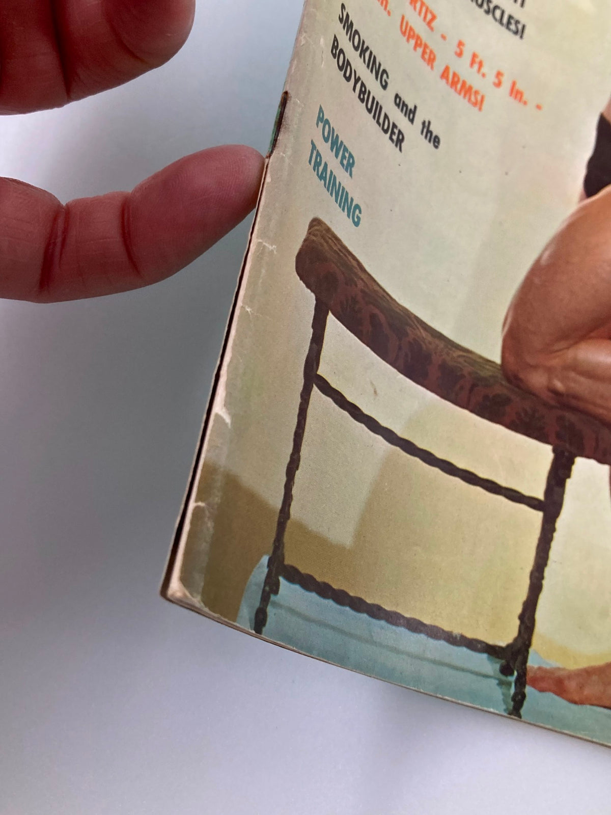 Side view of VTG Muscular Development Magazine January 1967 displaying spine and wear characteristics typical of a vintage collectible item.