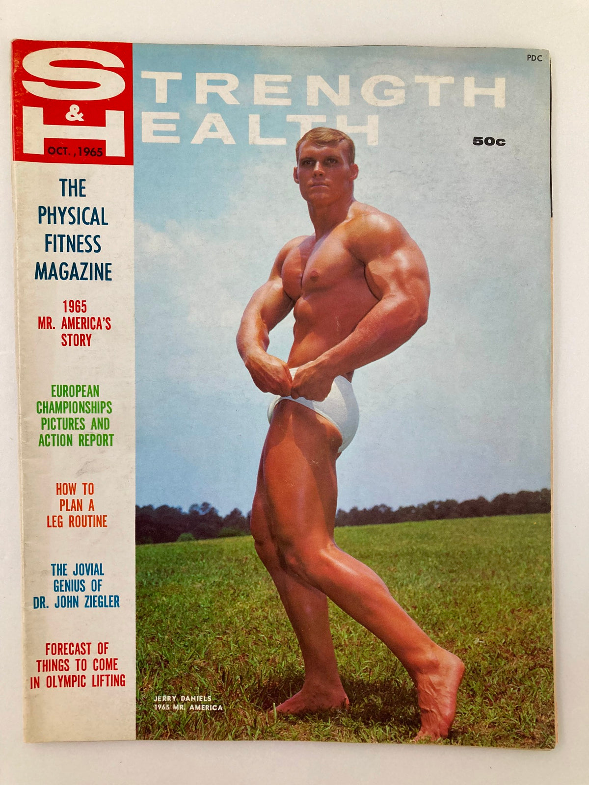 Cover of VTG Strength & Health Magazine, October 1965, Vol 33 #10 featuring bodybuilder Jerry Daniels showcasing his physique in a natural outdoor setting.