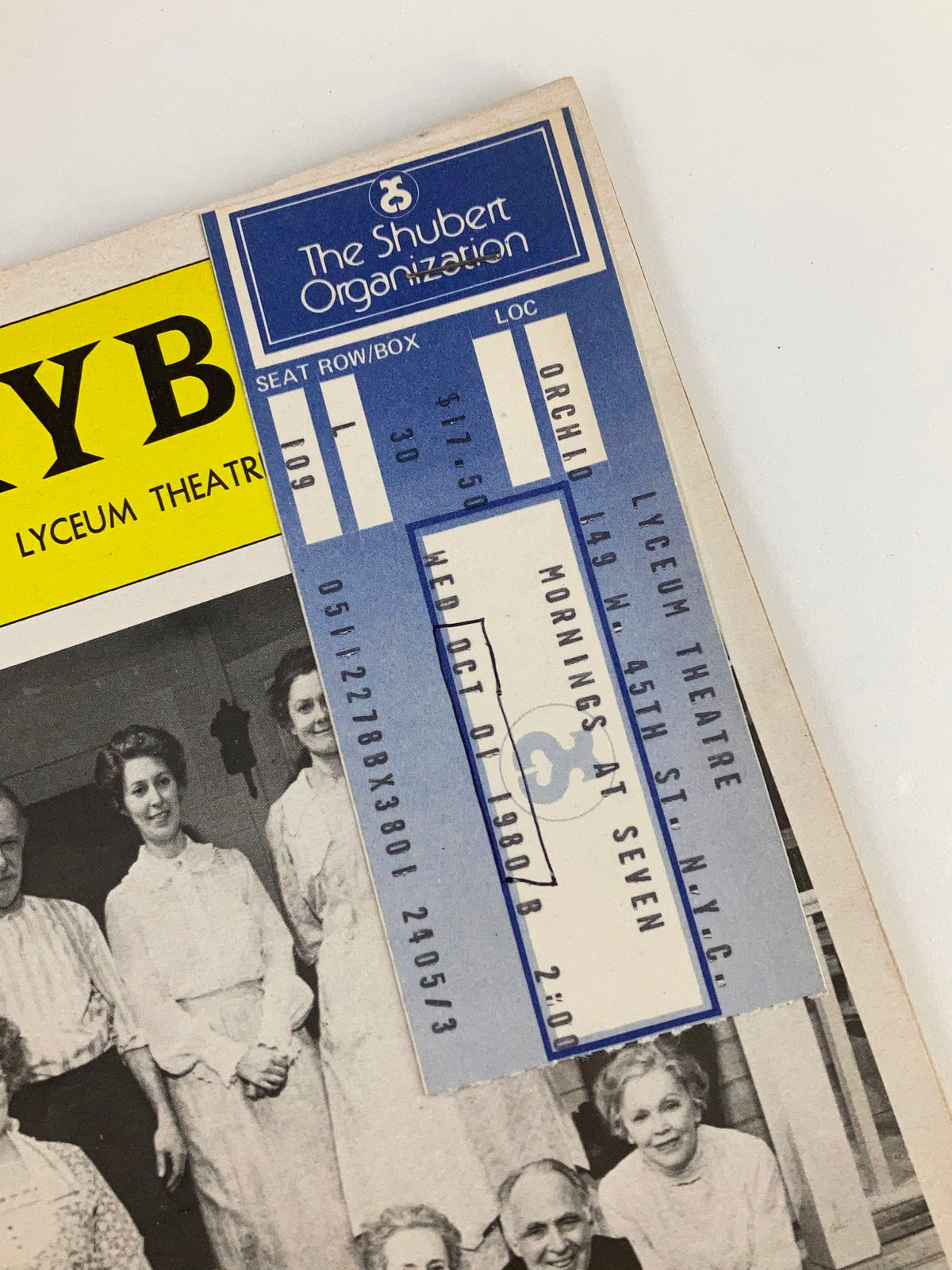 Close-up of the ticket stub attached to the 1980 Playbill from the Lyceum Theatre featuring Nancy Marchand in Morning's at Seven, highlighting its authenticity.
