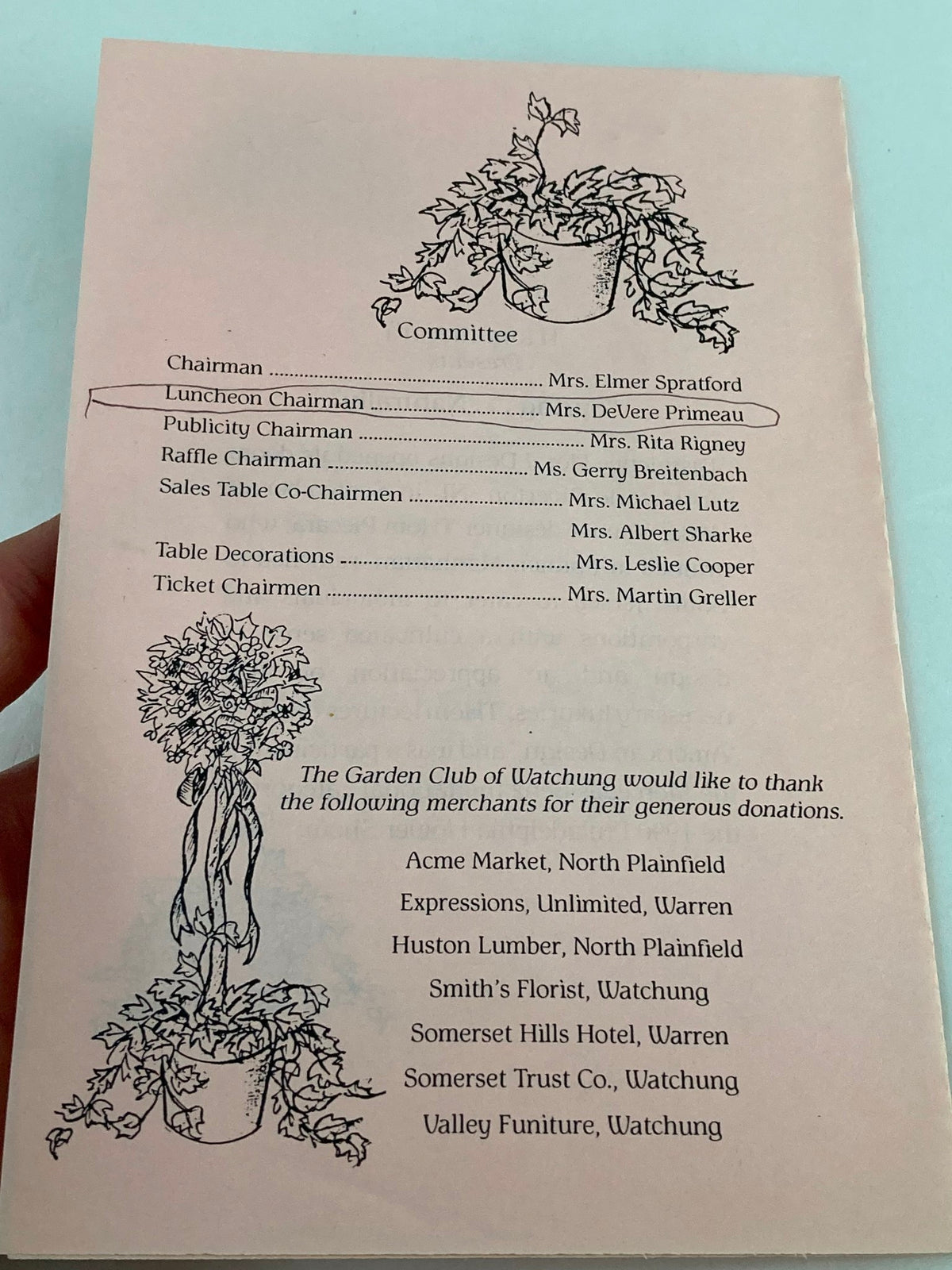 Inside view of the 1990 playbill titled 'The Garden Club of Watching Spring Naturally' by Mr. Thim Piecera, showcasing the committee members and their roles along with decorative plants.