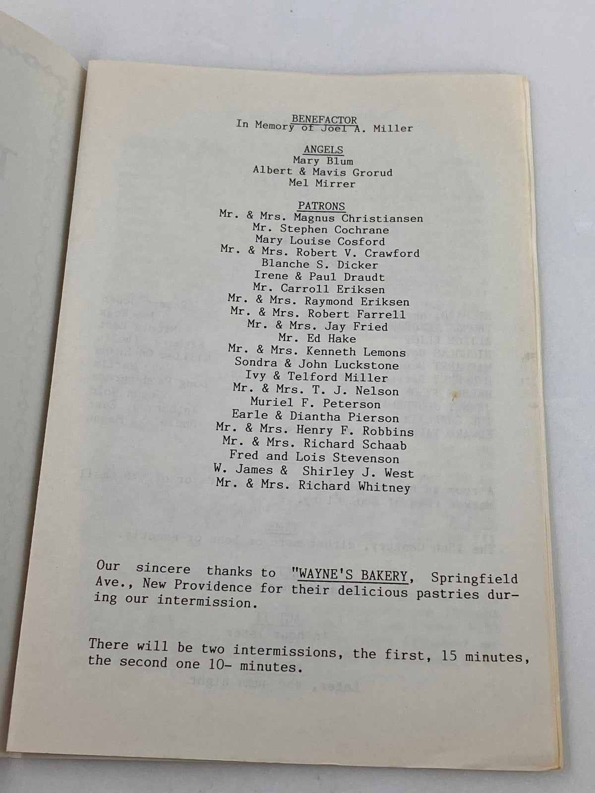Booklet page for the 1990 Stony Hill Players program of 'The Lady's Not For Burning,' listing benefactors and sponsors.