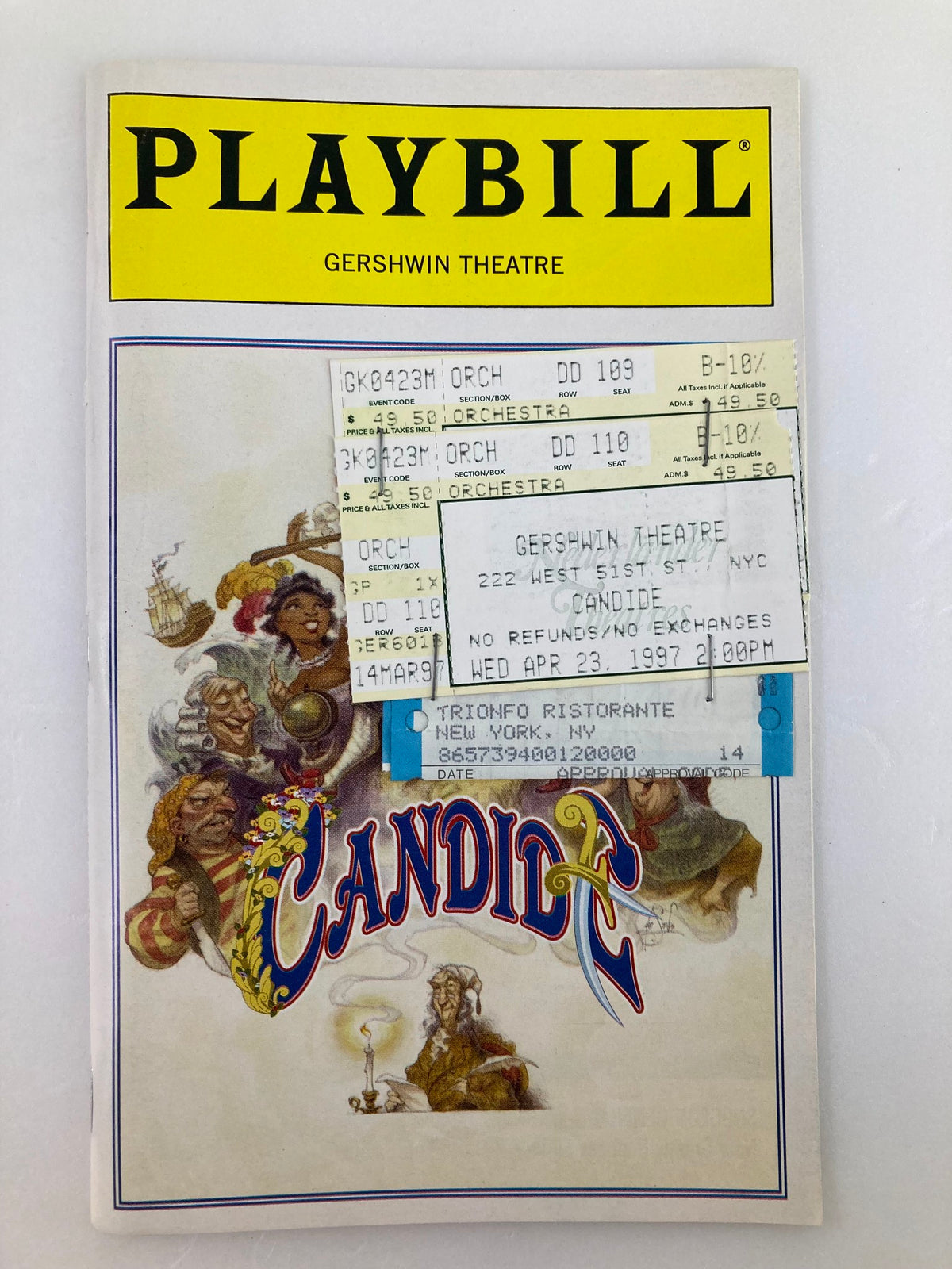1997 Playbill for Candide featuring performances at the Gershwin Theatre, with attached ticket stubs.