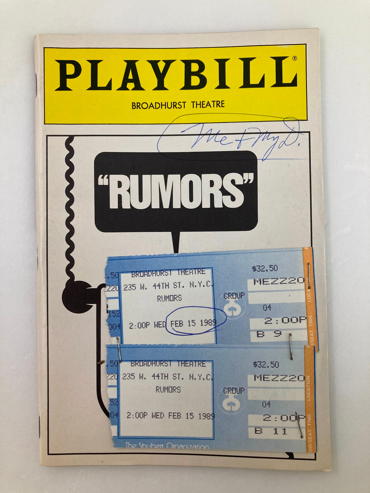 1989 Playbill titled 'Rumors' from the Broadhurst Theatre, featuring cast tickets and an autograph.