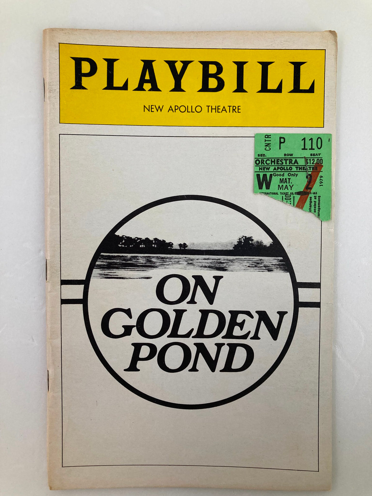 1979 Playbill from the New Apollo Theatre featuring the production 'On Golden Pond', showcasing the cover design with vibrant graphics and an attached ticket.