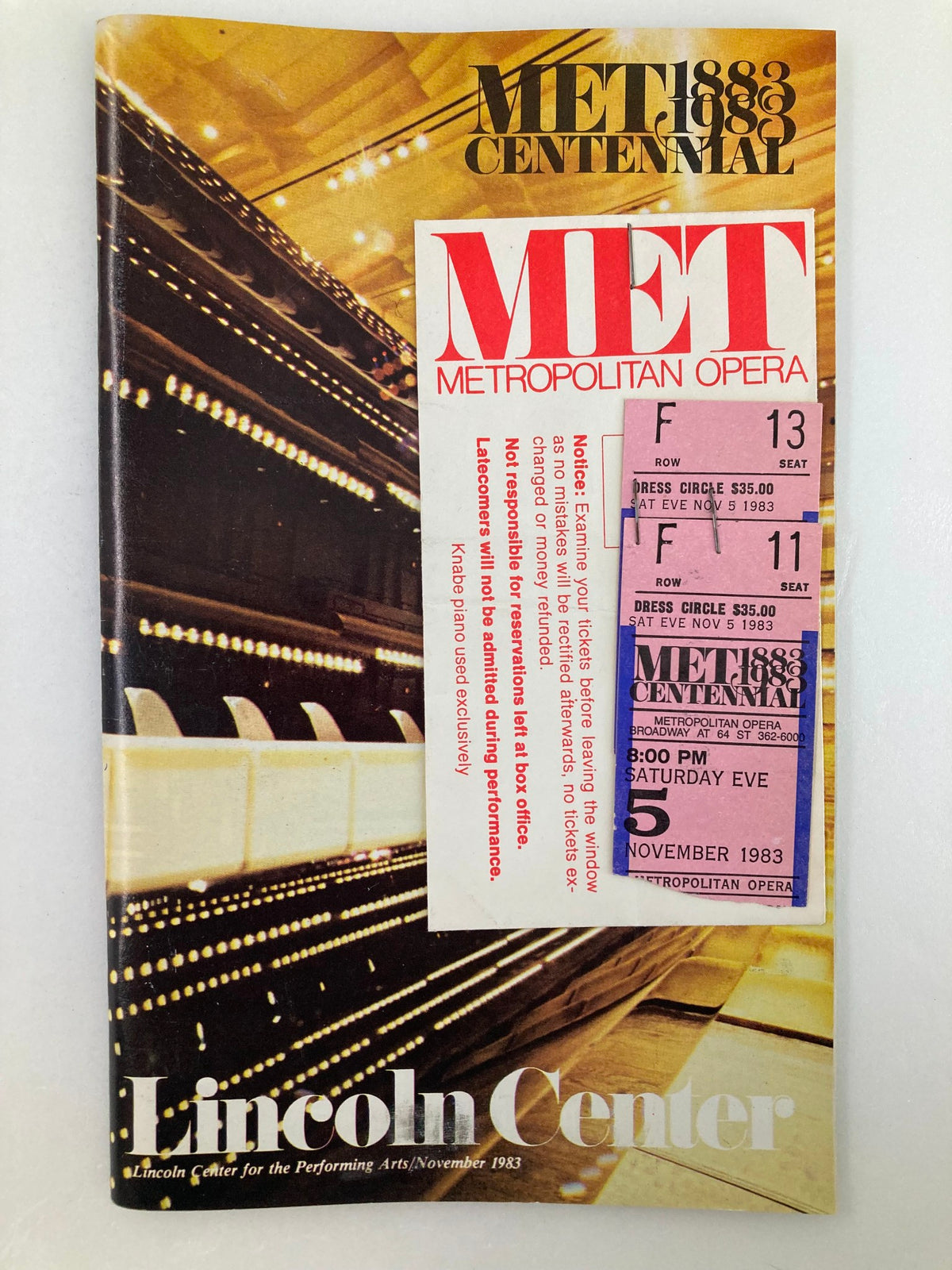 1983 Stagebill Lincoln Center featuring Giacomo Puccini's La Boheme Opera, showcasing the interior of the Metropolitan Opera with ticket stubs attached.