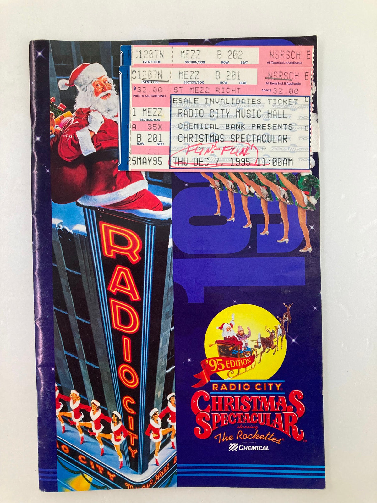 1995 Souvenir Program for the Radio City Christmas Spectacular featuring The Rockettes, showcasing vibrant graphics and ticket stubs attached, ideal for collectors.