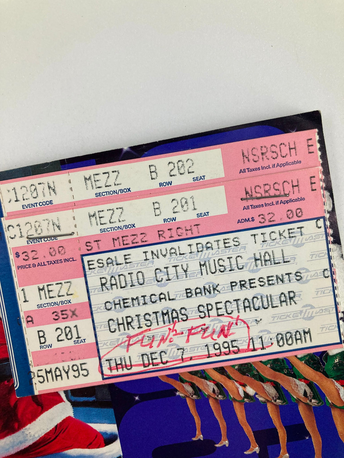 Close-up of the ticket stubs from the 1995 Radio City Christmas Spectacular program, highlighting event details and pricing, perfect for memorabilia enthusiasts.