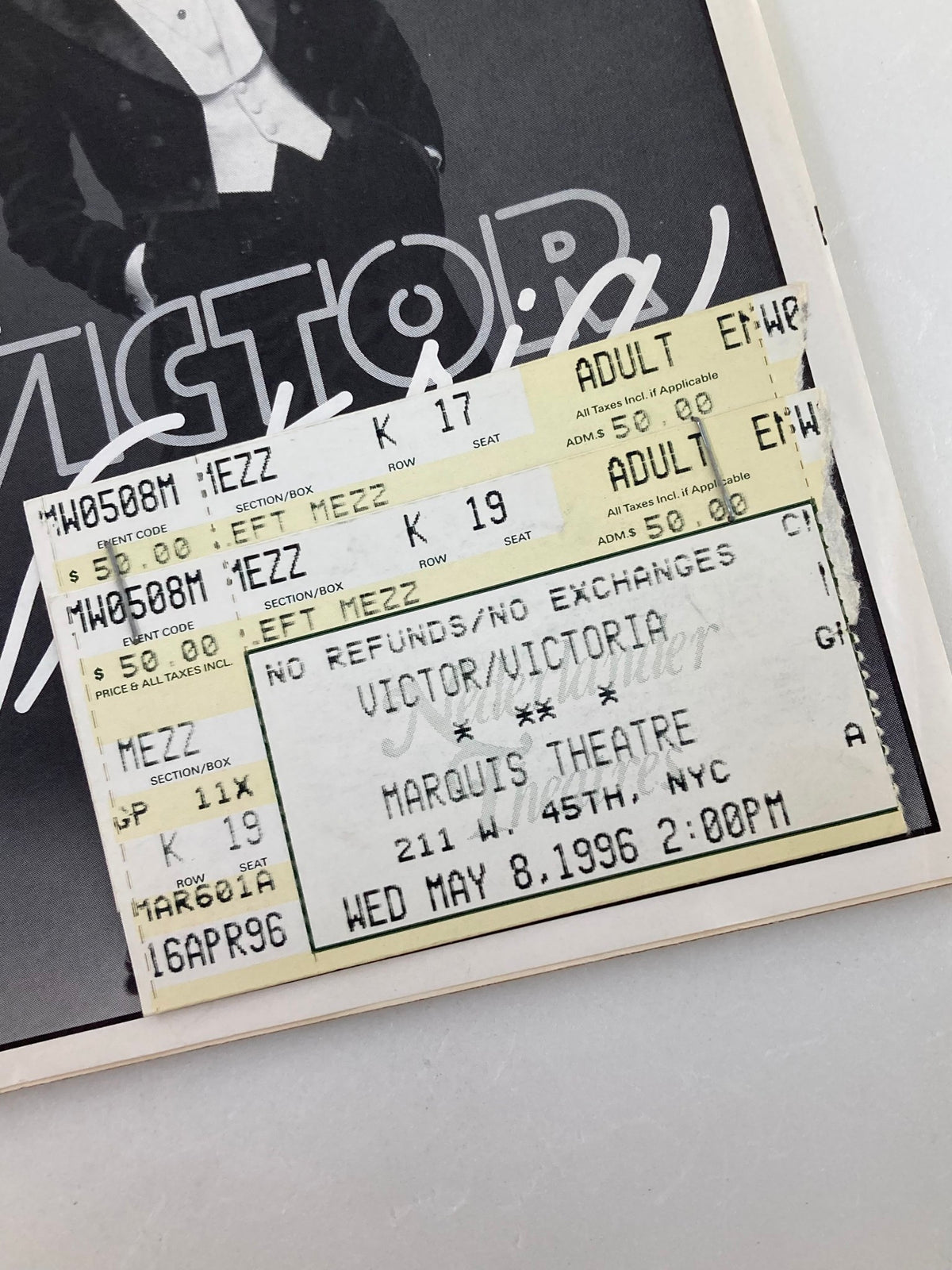 Close-up of the 1996 ticket stub attached to the Victor/Victoria Playbill, highlighting details of the show at the Marquis Theatre.