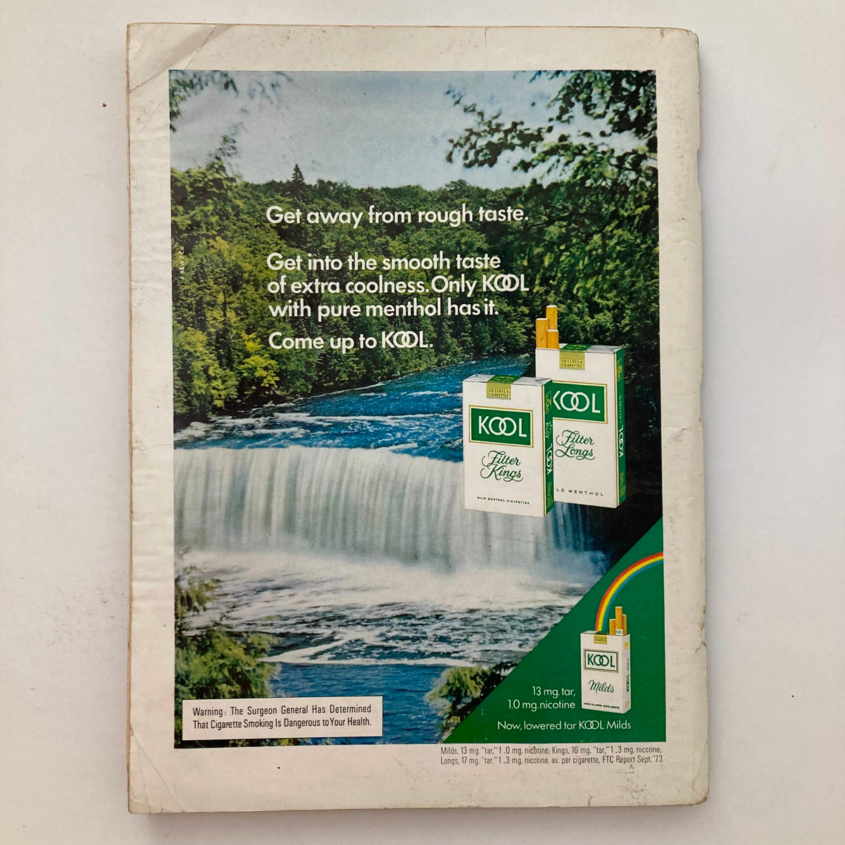 Back cover of VTG Playboy Magazine January 1974 featuring Kool cigarette advertisement set against a scenic waterfall backdrop.