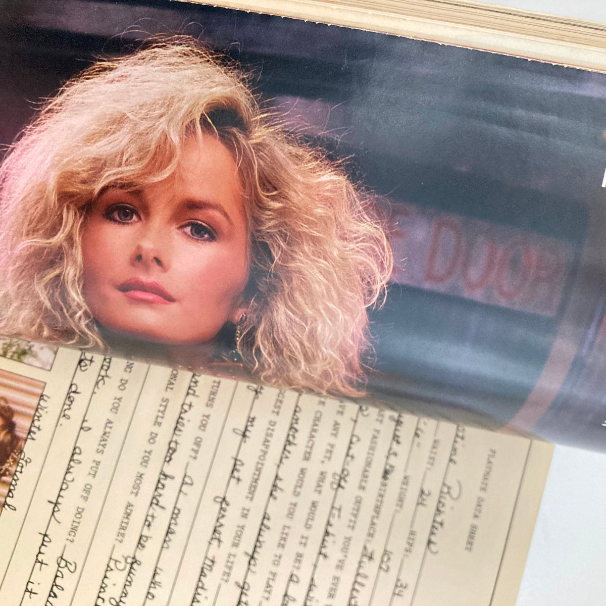 VTG Playboy Magazine May 1986 interior page showing a beautiful image of a model alongside handwritten notes, emphasizing the magazine's artistic design and nostalgia.