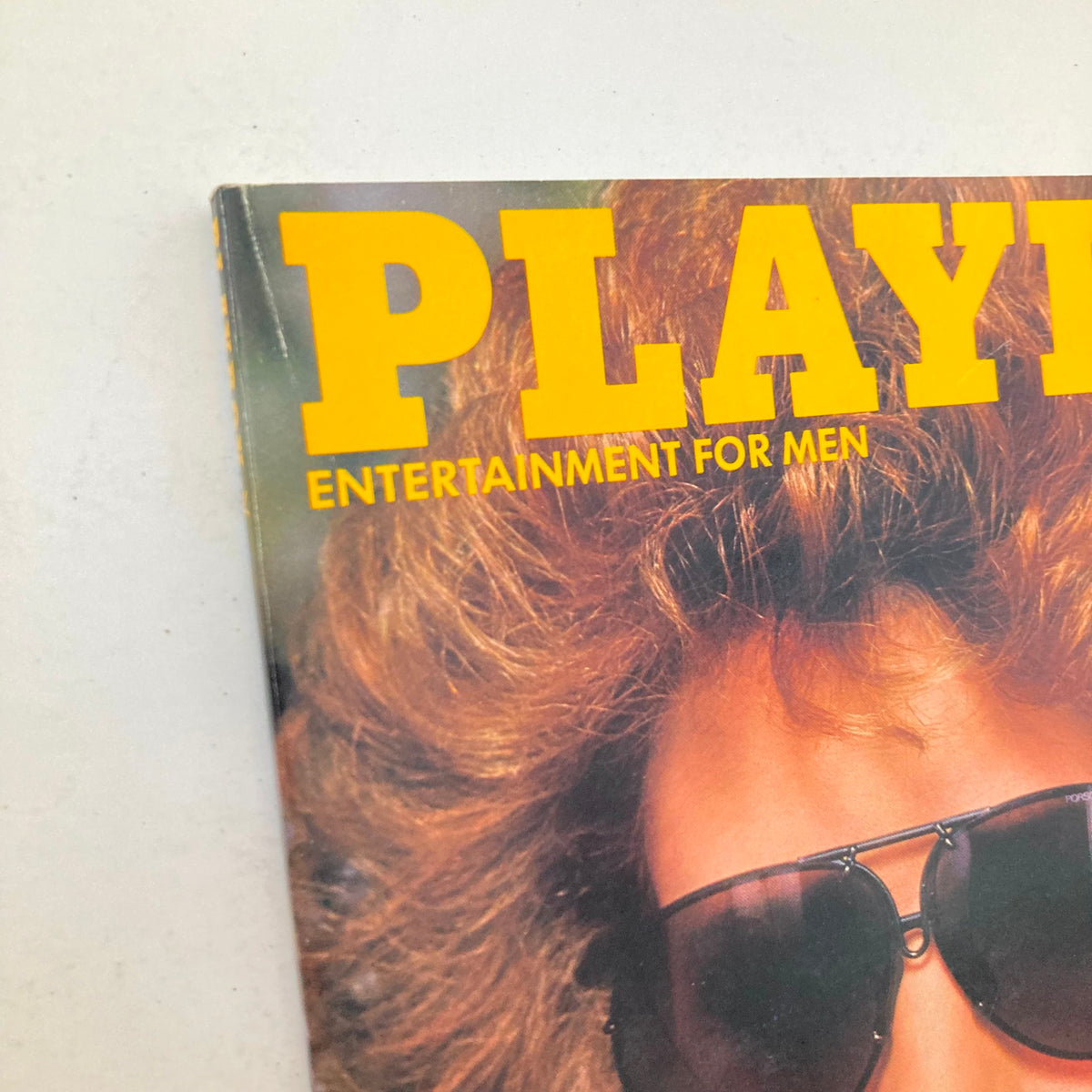 Close-up of the VTG Playboy Magazine November 1987 cover showing the title with a focus on the lettering and Jessica Hahn's hairstyle.