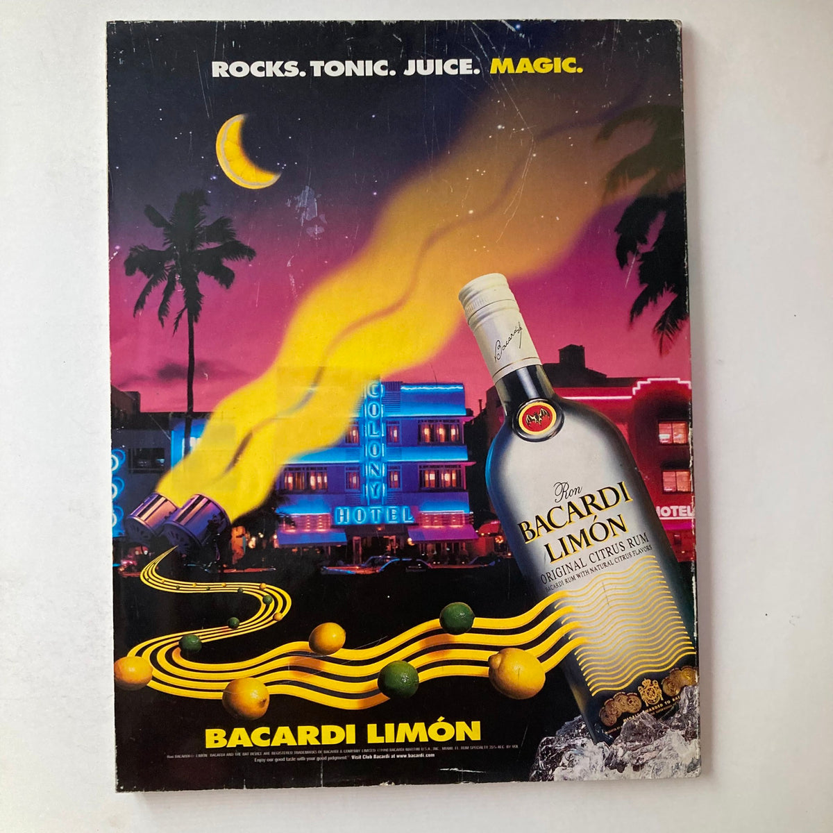 Vintage advertisement for Bacardi Limón featured in Playboy Magazine August 1998, showcasing colorful and eye-catching design elements.
