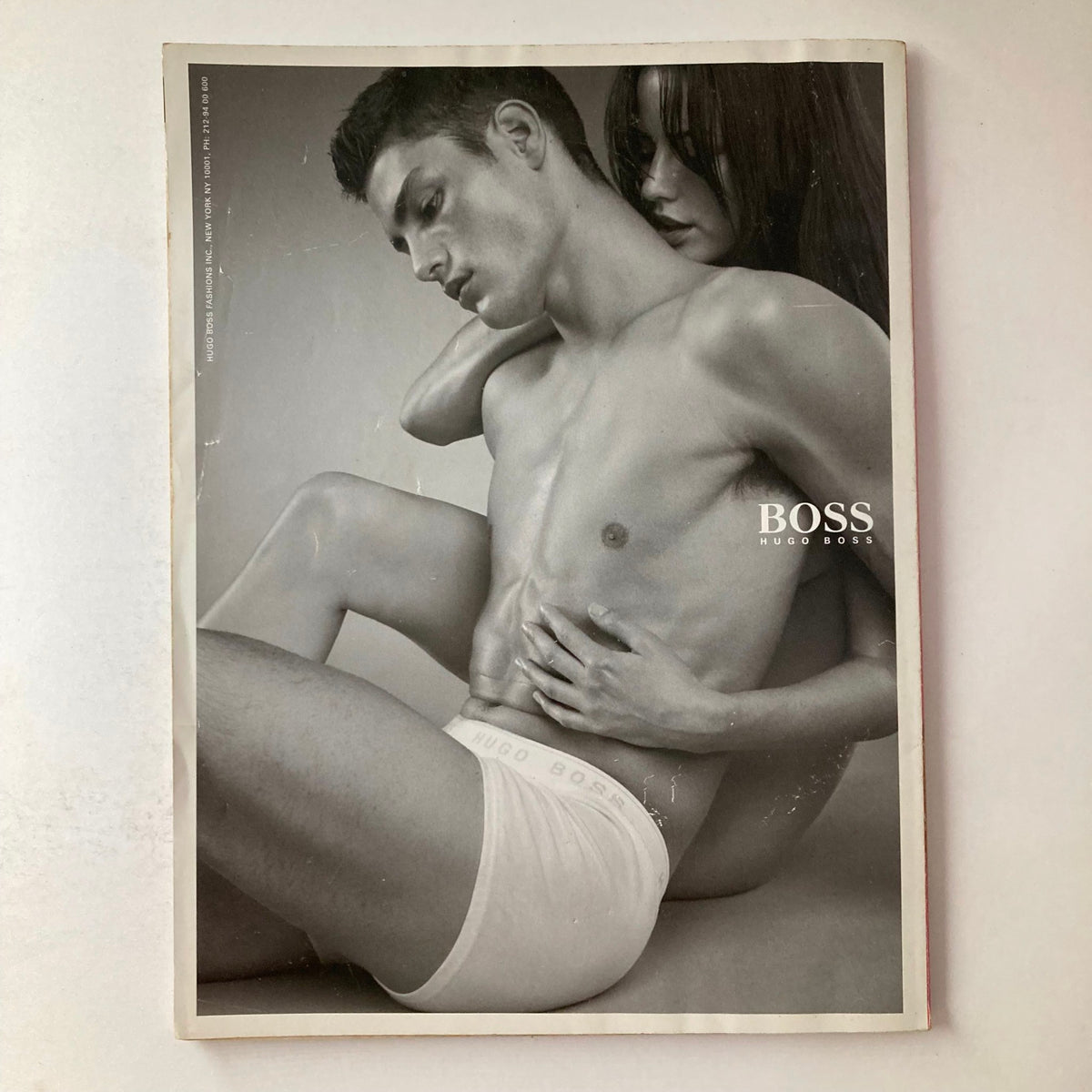 Playboy Magazine February 2001 Anna Nicole Smith cover with a stylish black and white editorial featuring a male model and a female model highlighting fashion and sensuality.