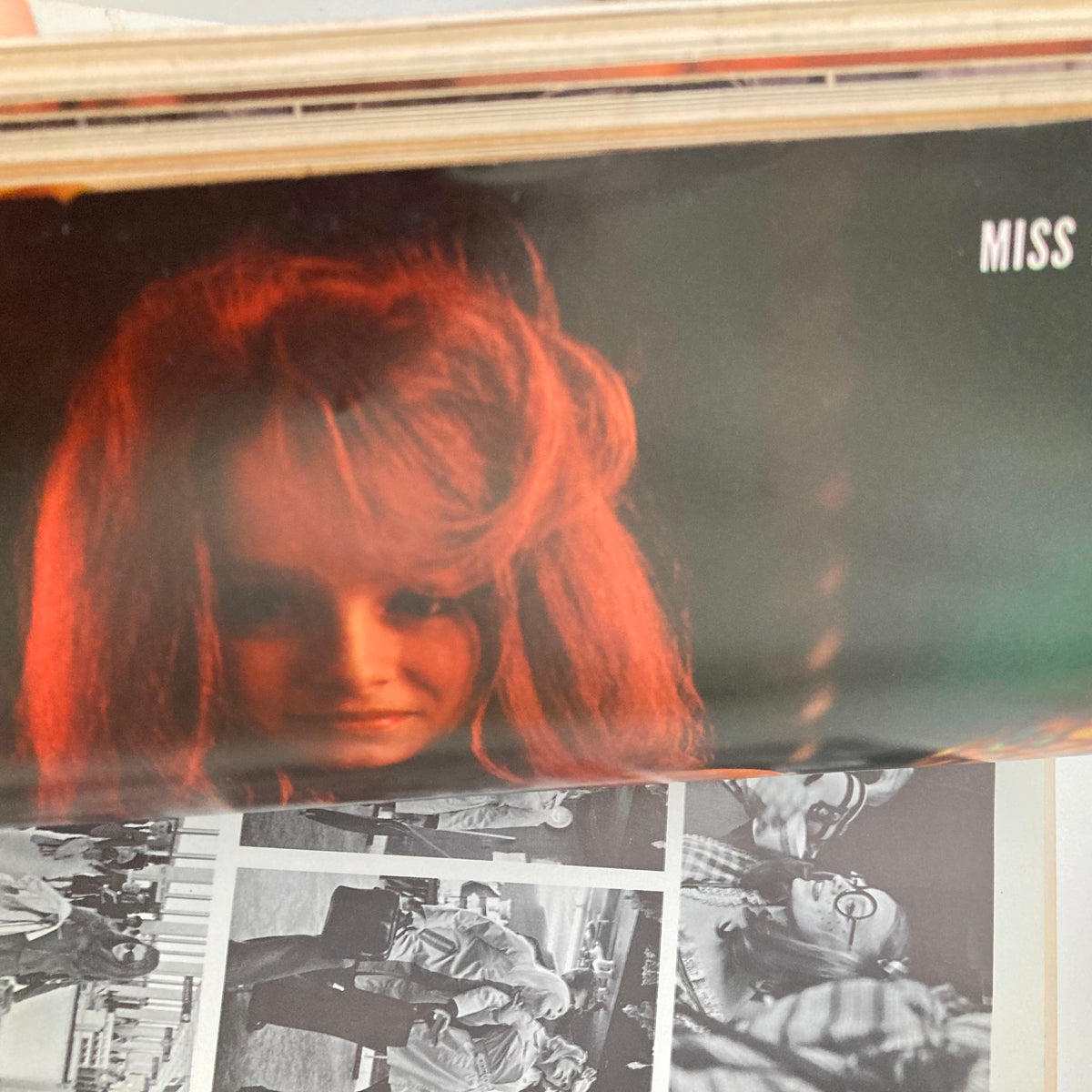 Interior page from Playboy Magazine November 1969 showing a close-up photograph of a young woman with striking red hair and expressive features.
