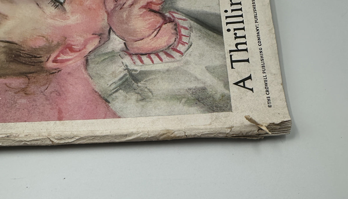 Detail of Woman’s Home Companion Magazine June 1936 featuring baby cover, showcasing wear and creases on the magazine edge.