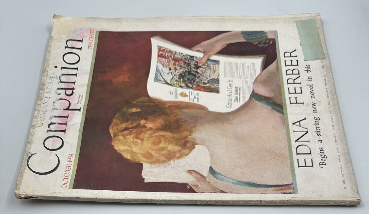 Close-up of the cover of Woman’s Home Companion Magazine October 1934, highlighting Edna Ferber’s novel and artistic details of the woman reading.
