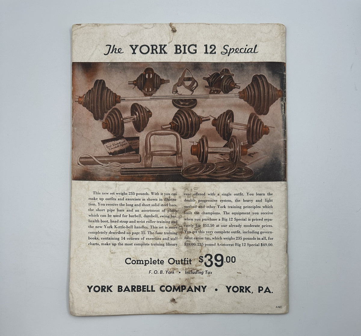The York Big 12 Special advertisement showcasing workout equipment including weights and bars, promoting a complete outfit for $39. This image accompanies the Strength and Health Magazine June-July 1949 featuring Jack Delinger, winner of the Mr. America contest.
