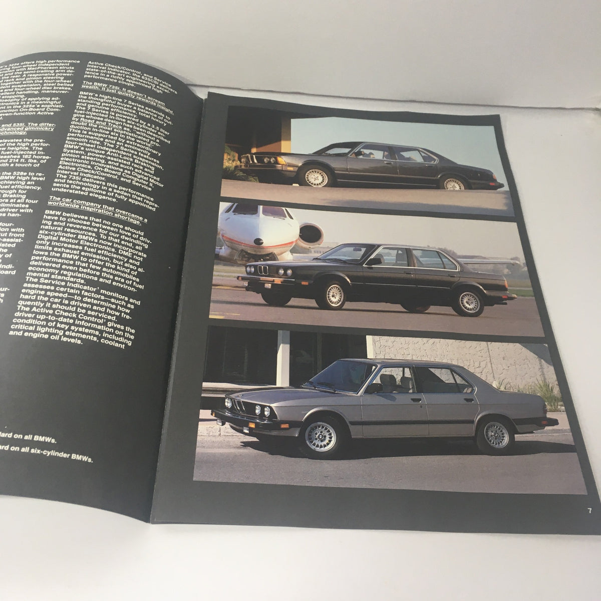 Inside pages of the 1994 BMW 7 Series 735i Dealership Car Auto Brochure showcasing images of BMW models with a sleek design.