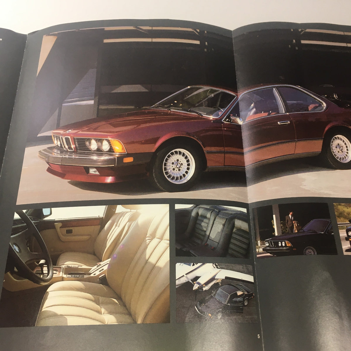 Highlighted images from the 1994 BMW 7 Series 735i Dealership Car Auto Brochure featuring a luxury interior and exterior shots of the BMW vehicle.